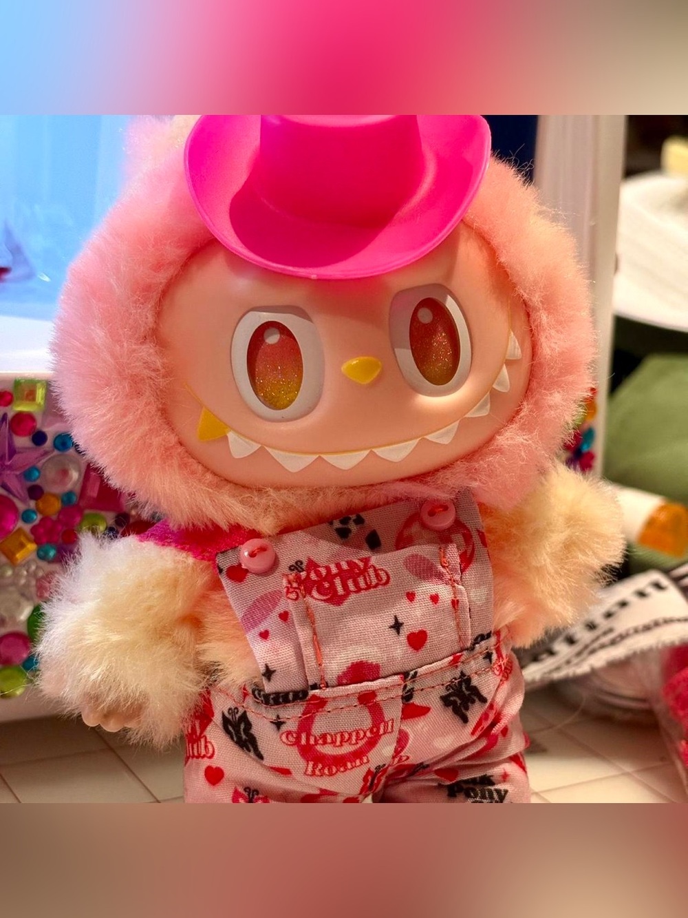 Chappell Roan Pink Pony Club Labubu Overalls outfit with cowboy hat bag charm ac